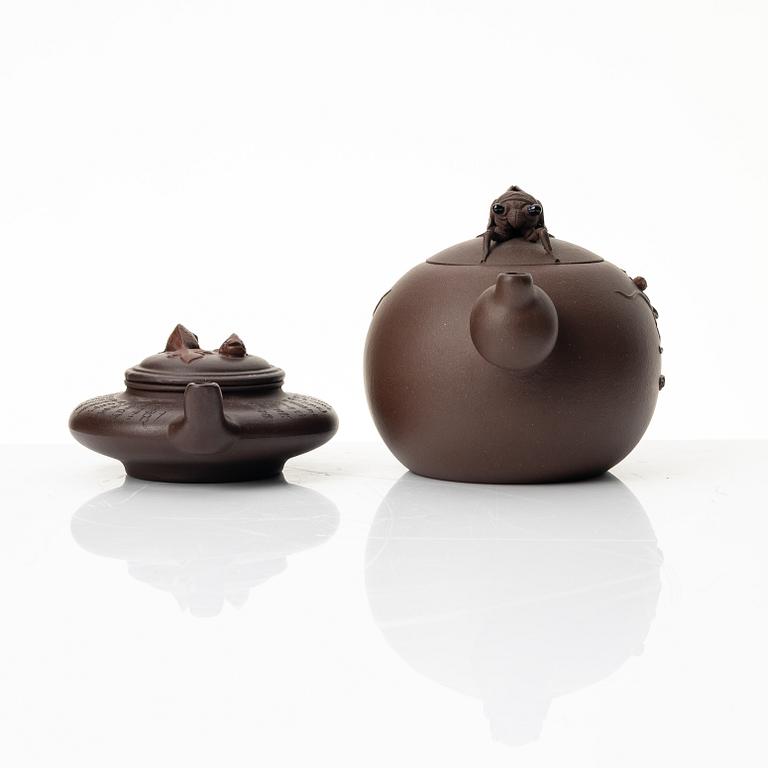 Two yixing teapots, China, 1980s and 2000.