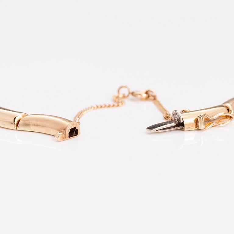 A 14K gold necklace and bracelet.