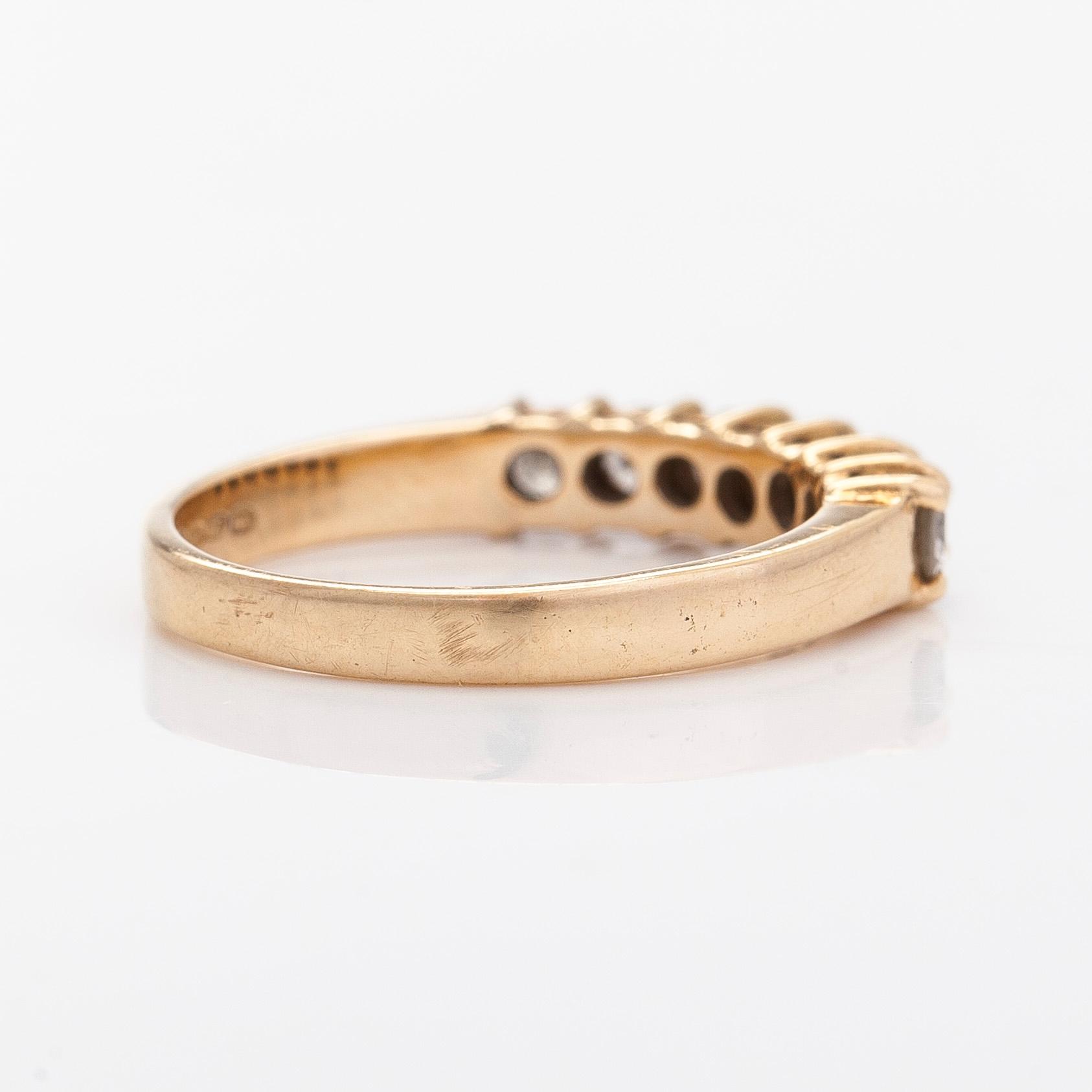 Ring, halvallians, 14K guld med briljantslipade diamanter. Finska importstämplar 1990.