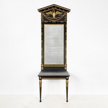 An Empire mirror by Jonas Frisk (Stockholm 1805-1824), and a later console table.