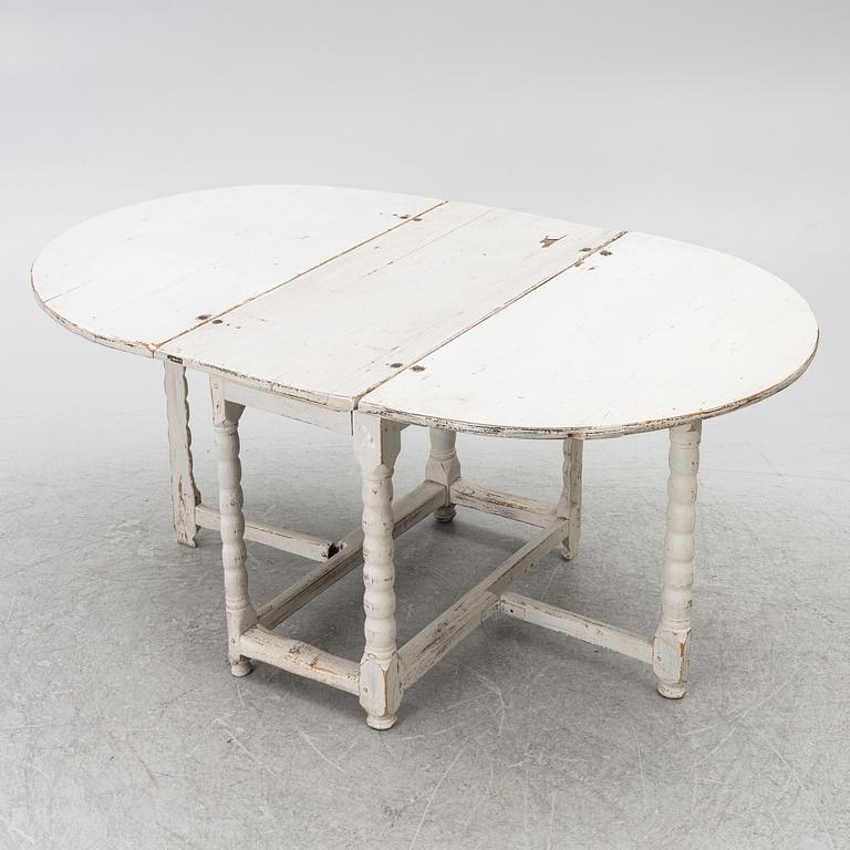 A drop-leaf table, 19th century.