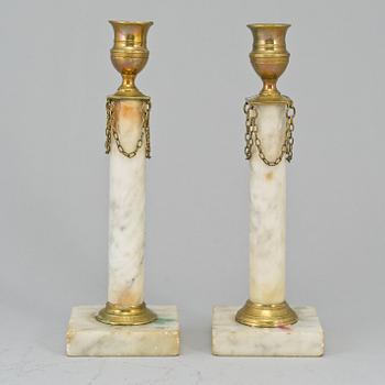 Two similar late gustavian  candlesticks, ca 1800.