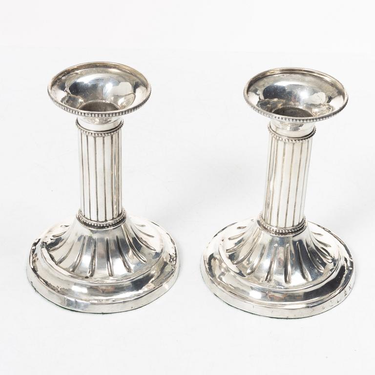 A Swedish pair of 18th century Gustavian silver candlesticks, worn city and maker’s marks, Sweden 1795.