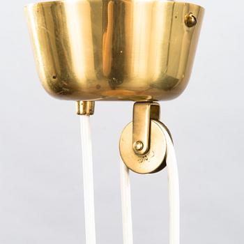 A mid-20th Century ceiling light, model A1998, for Taito Finland.