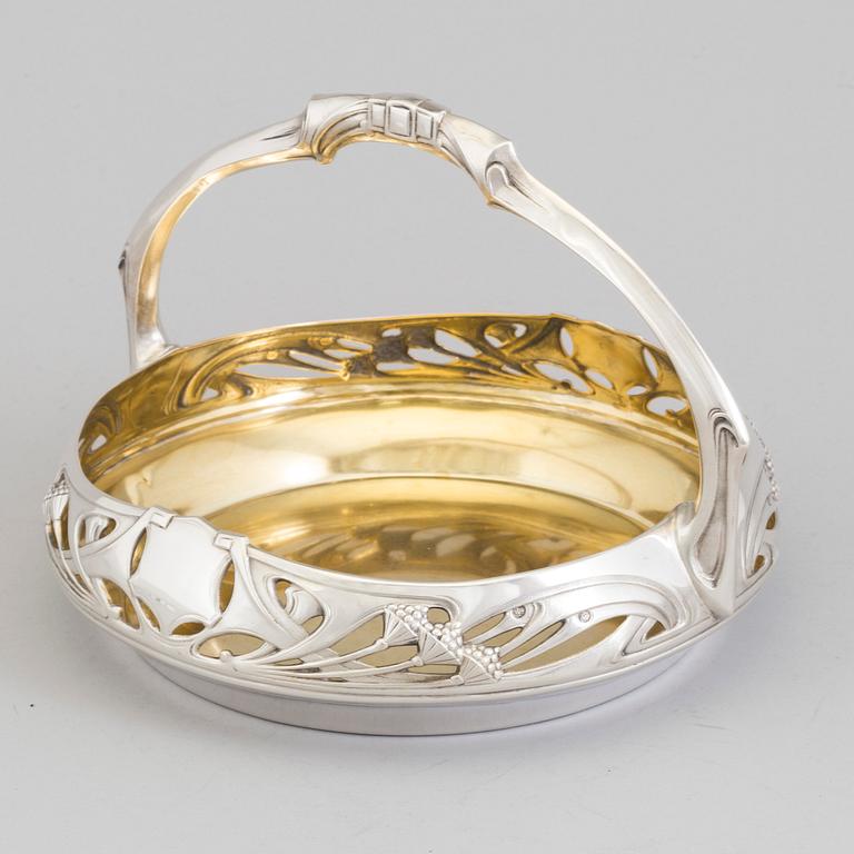 A Swedish Art Nouveau parcel-gilt basket, maker's mark CF Carlman, Stockholm 1906.