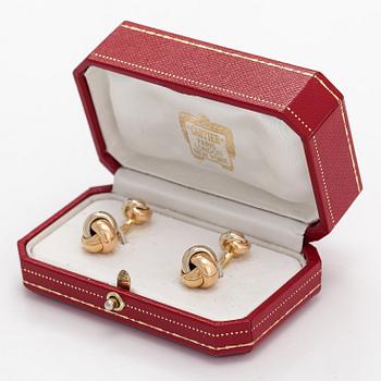 Cartier, A pair of 18K gold "Trinity" cufflinks. Marked Cartier M03073.