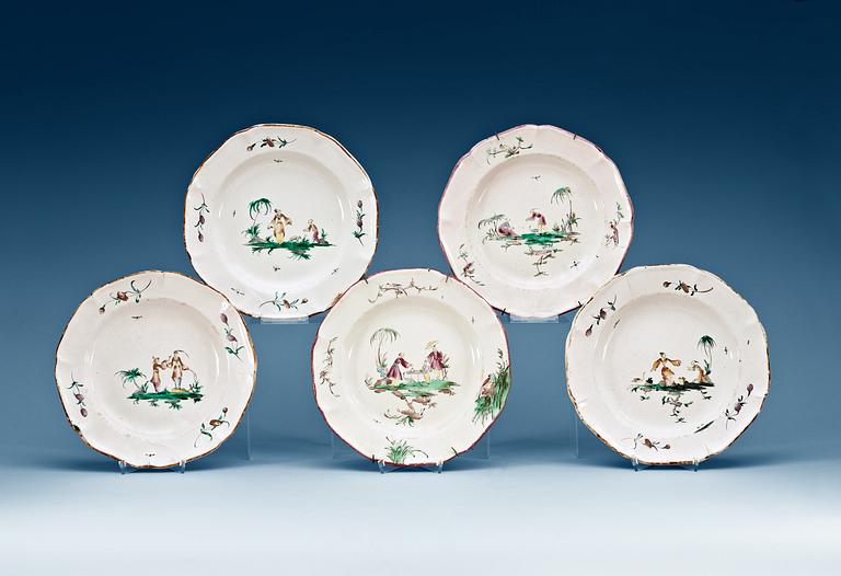 A set of five French faience plates, 18th Century.
