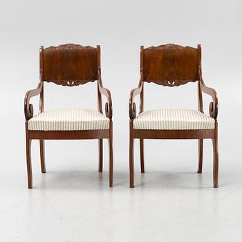 A pair of Empire style mahogany chairs, around 1900.