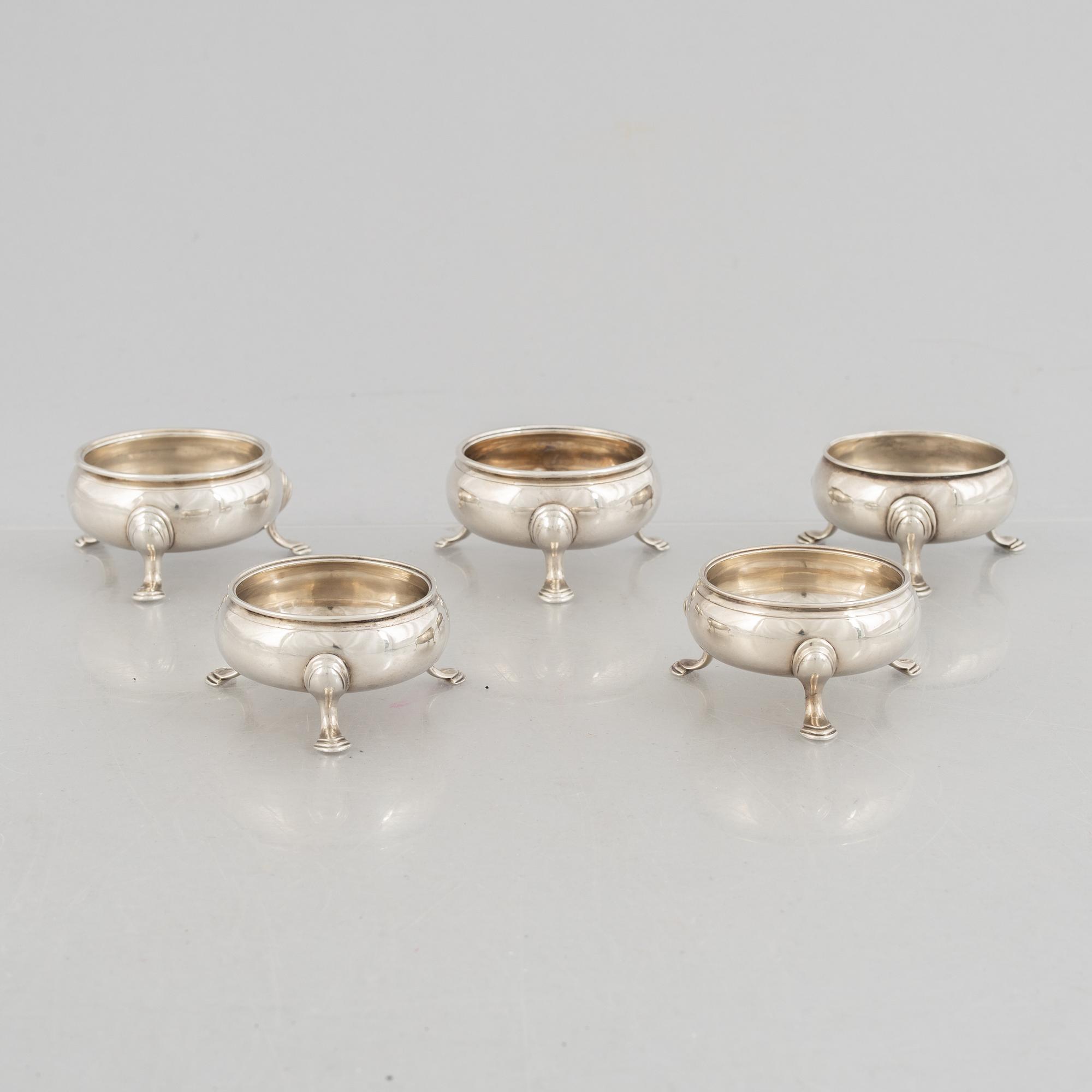 Five English silver salt cellars, circa mid 18th Century.