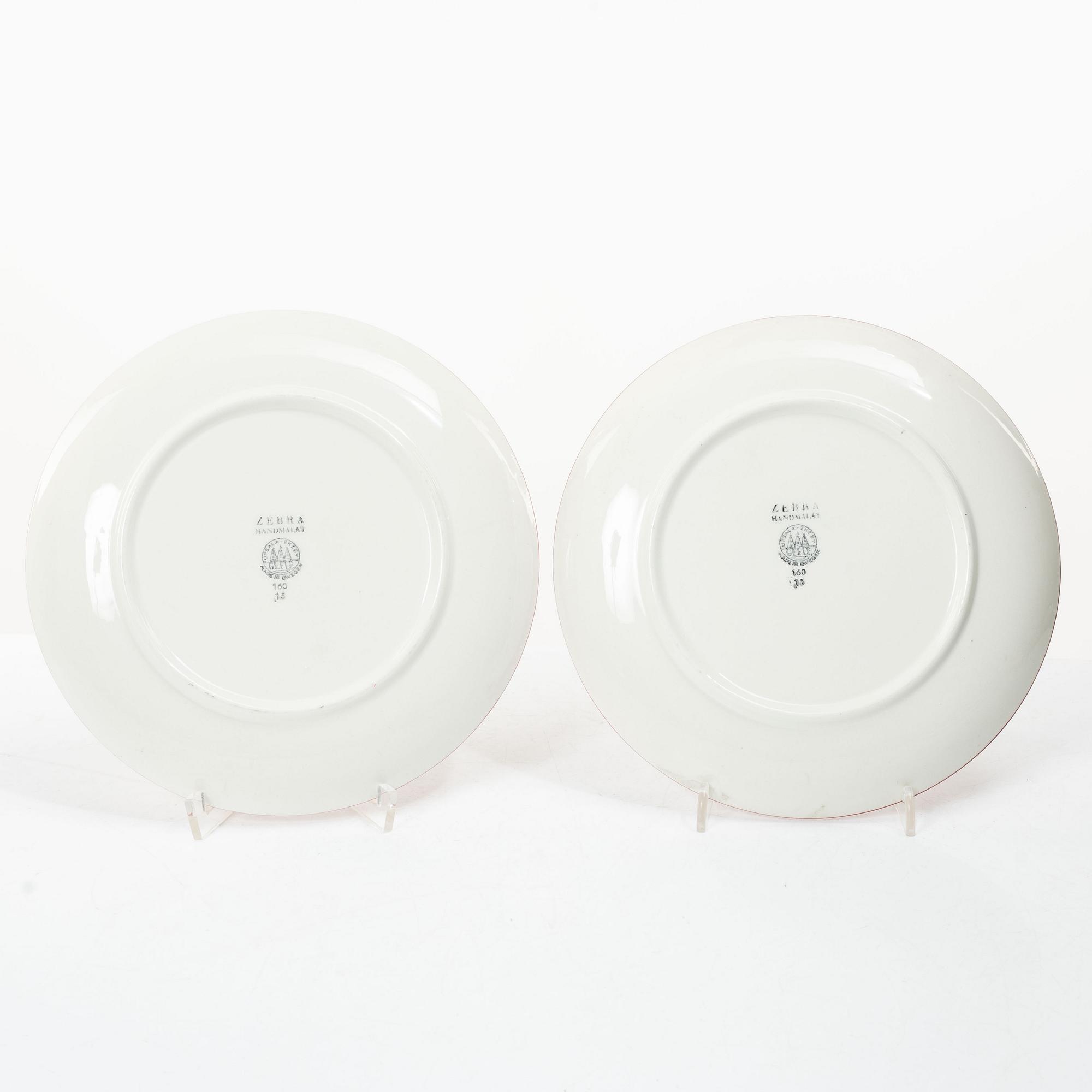 Eugen Trost, Five 'Red Zebra' cream-ware side plates. Uppsala-Ekeby Gefle.