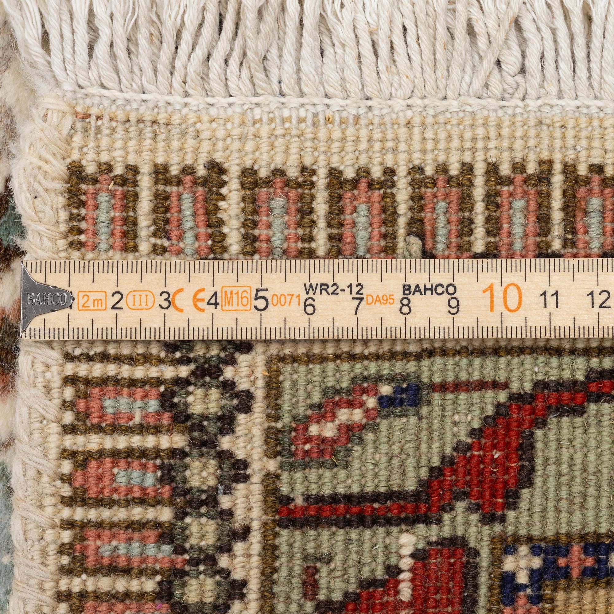 A Tabriz type carpet, c. 300 x 200 cm.