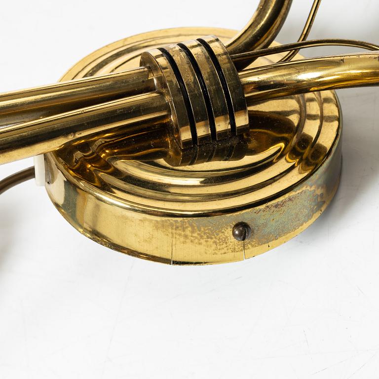 A pair of Scandinavian Modern wall lamps, 1940s.