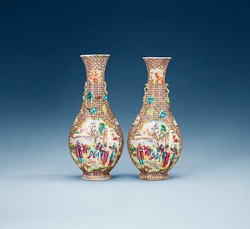 A pair of famille rose vases, Qing dynasty, Qianlong (1736-95).