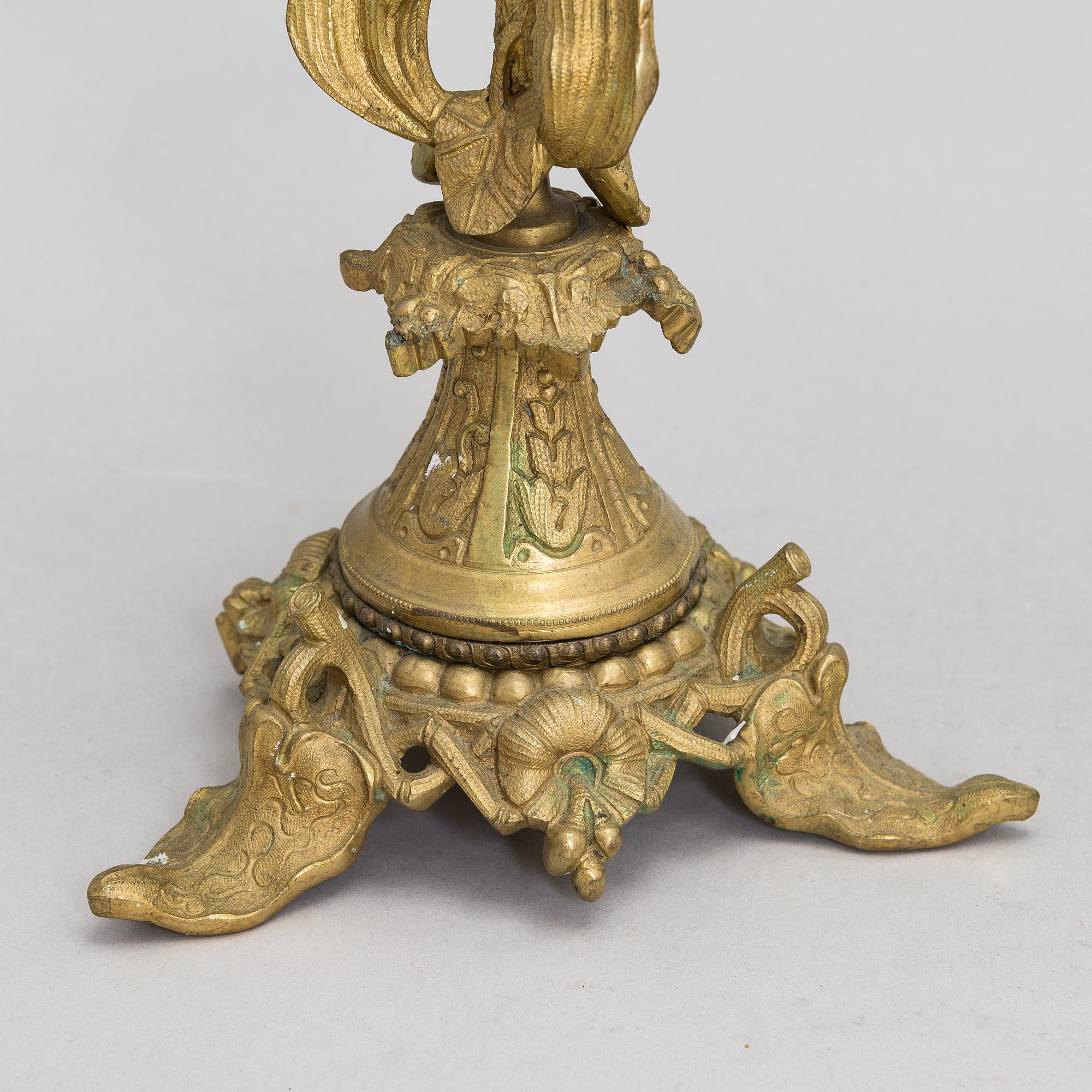 A pair of bronze candelabra from the latter half of the 19th Century.