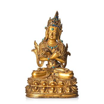 A gilt-bronze figure of Vajradhara
Tibet, circa 16th century.
