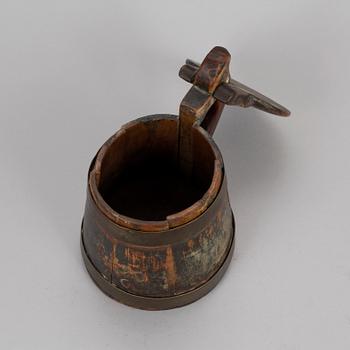 A swedish folk art wood tankard.