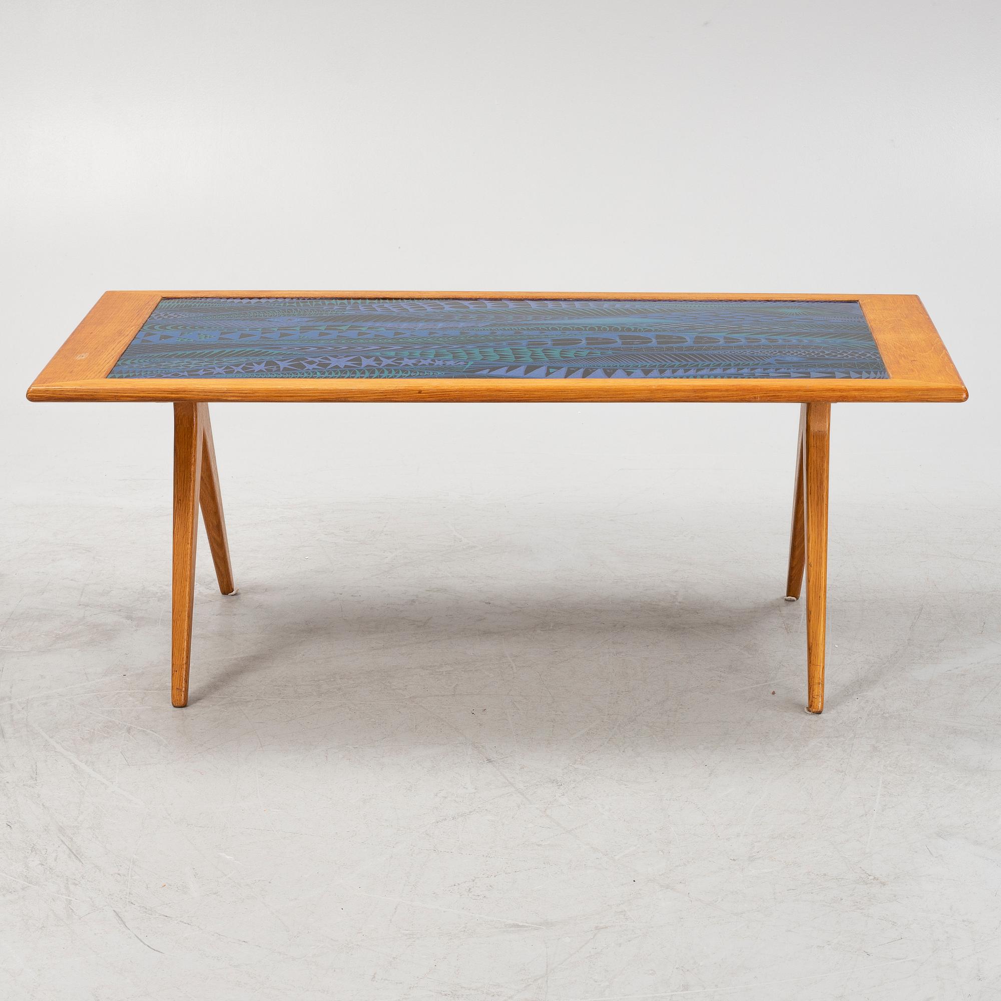 Stig Lindberg & David Rosén, an oak and enamel coffee table from Nordiska Kompaniet and Gustavsberg, 1950's.