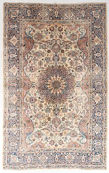 An antique Tabris carpet approx 304x212cm.