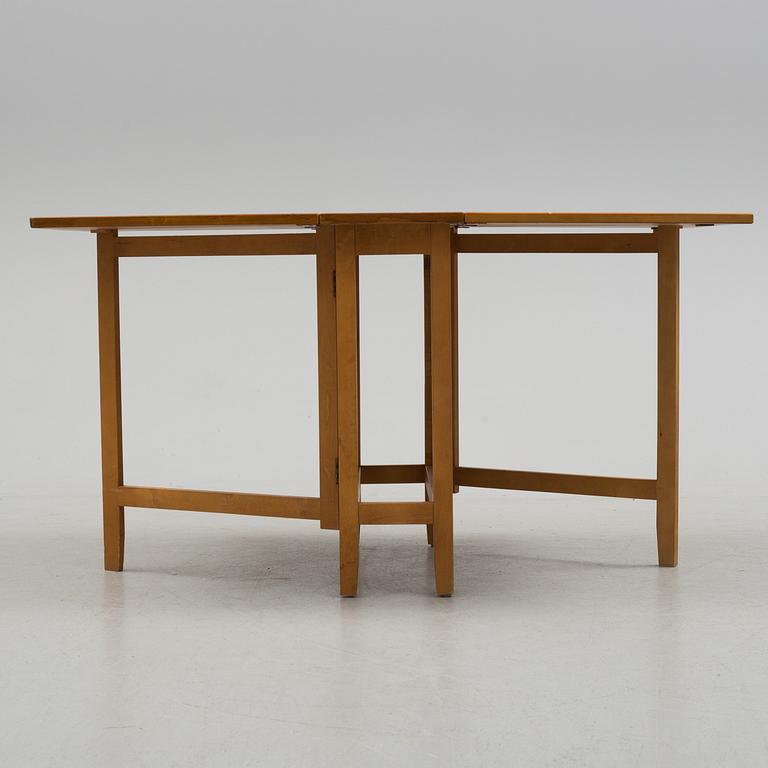 A mid 20th century flap table.
