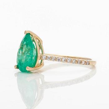 Ring, 14K gold with pear-cut Colombian emerald and diamonds. Accompanied by GIA report.