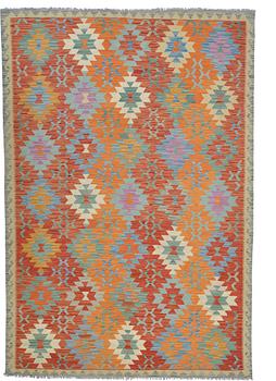 A CARPET, kilim, ca 292 x 201 cm.