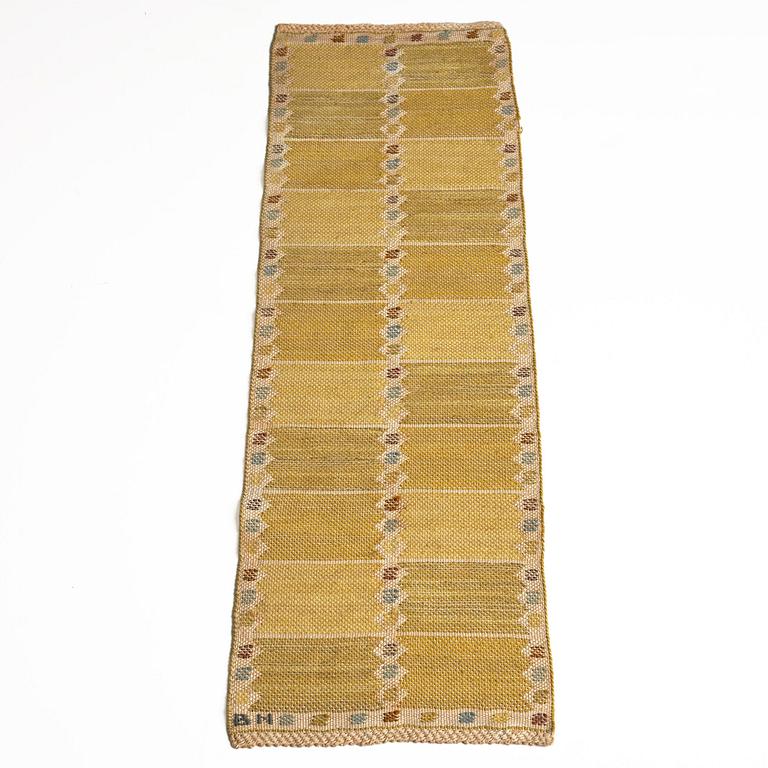 Barbro Nilsson, a 'Kvadrater på linne, gul' textile, flat weave, c 84 x 26 cm, signed BN.