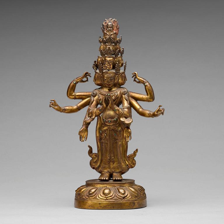 A Tibeto-Chinese gilt bronze figure of eleven-headed Avalokiteshvara, 19th Century.