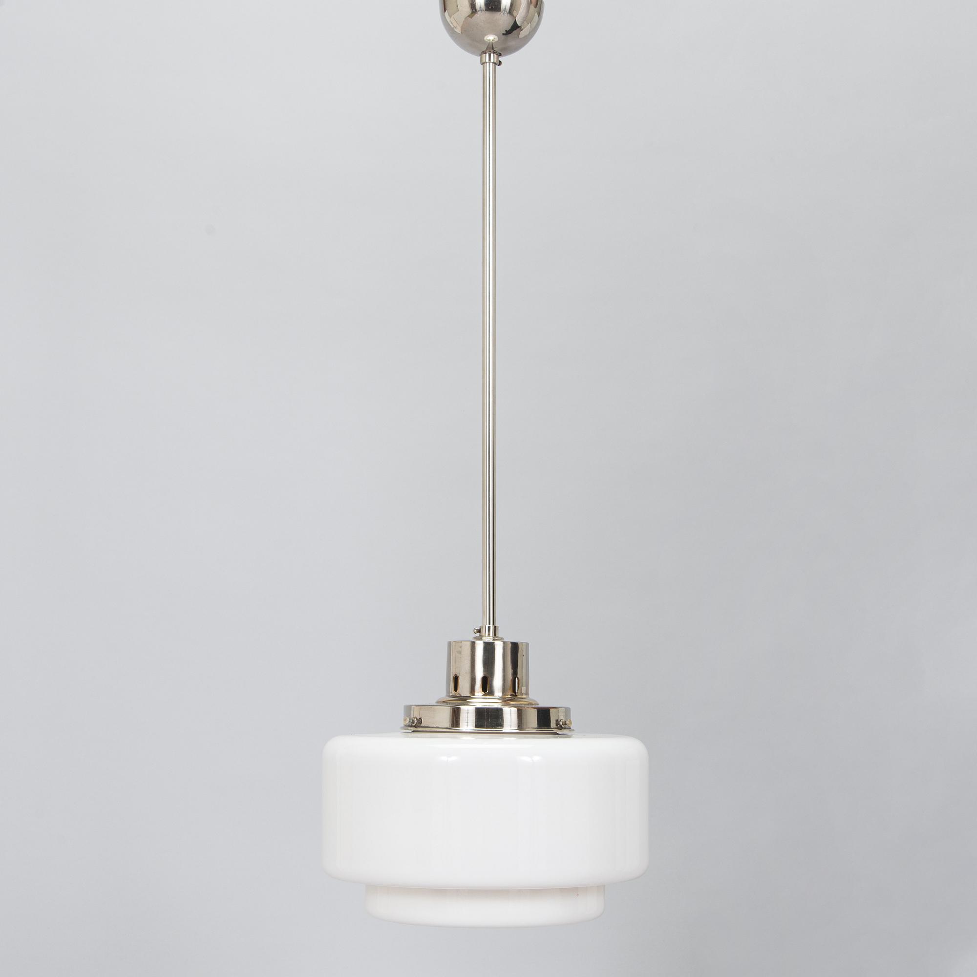 Paavo Tynell, kattovalaisin, malli 2004, Taito 1930-luku.