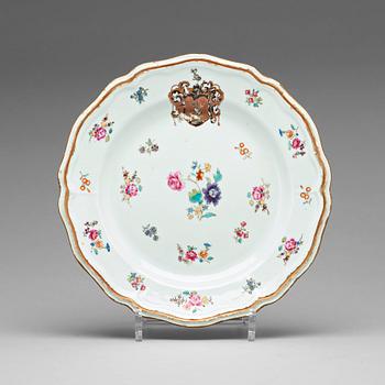 736. A famille rose armorial dinner plate, Qing dynasty, Qianlong (1736-95).