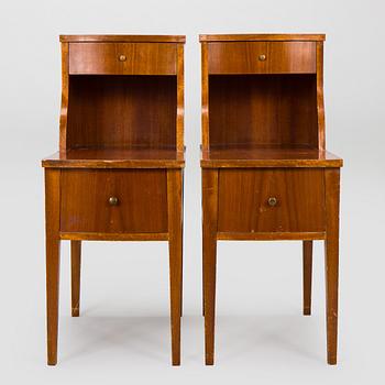 A pair of 20th century bedside tables.