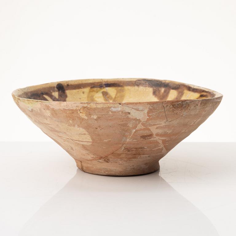A glazed earthenware bowl, possibly Hispano-Moresque.
