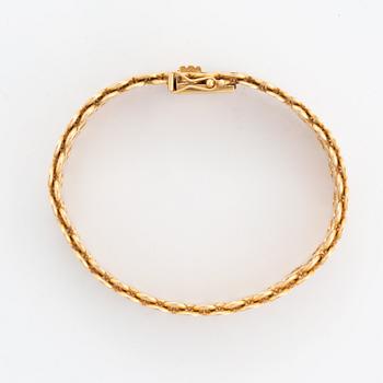 Armband, 18K guld, tät x-länk.