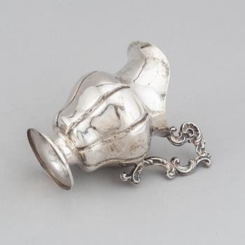 A Swedish 19th century parcel-gilt silver cream-jug, mark of Oskar Ahlström, Södertälje 1856.