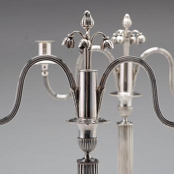A pair of Swedish 18th century silver candleabra,  mark of Pehr Zethelius, Stockholm 1799.