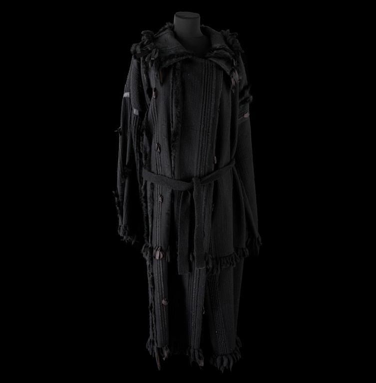 A black coat by Gucci.