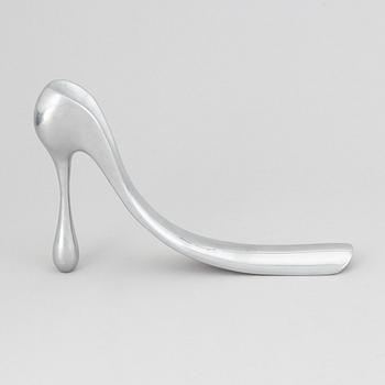 Manolo Blahnik, a metal shoe horn, 21st century.