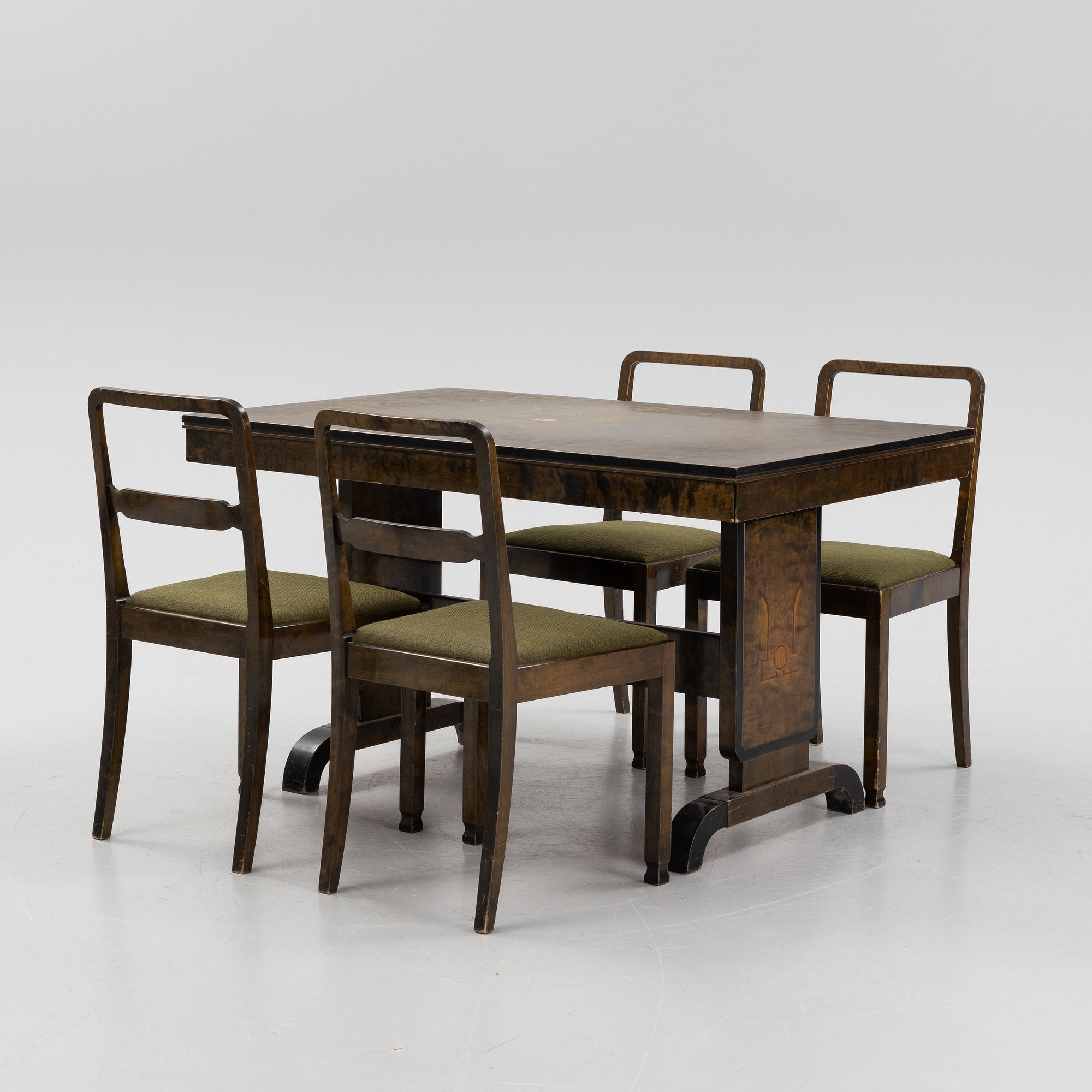 A Swedish Grace birch dining table and four chairs, 1920's/1930's.