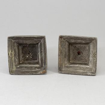 A pair of 18th century pewter candlesticks, London.