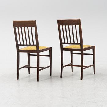 A group of five rosewood veneered chairs and a stool, mid 20th Century.