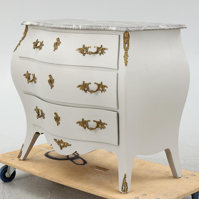 A Rococo style chest of drawers, mid-20th Century.