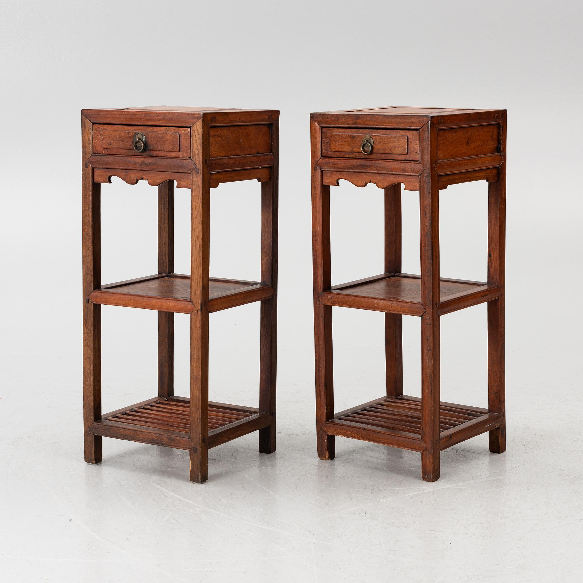 A pair of Chinese lamp tables / pedestals, hardwood, 20th century.
