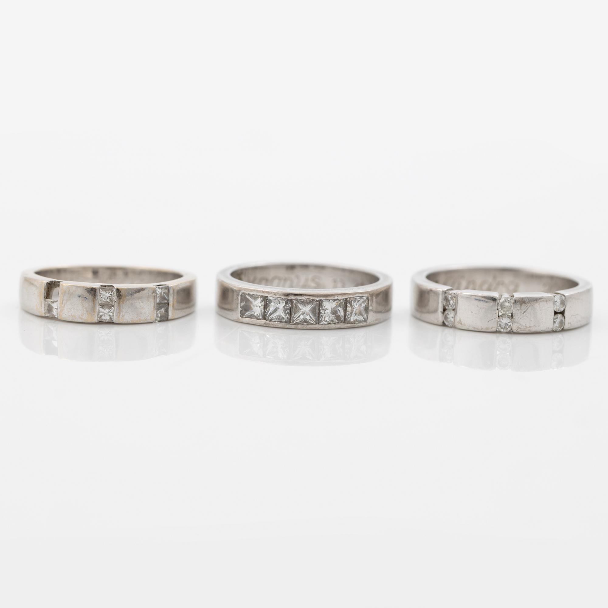 Three rings, 18K white gold with brilliant-cut and princess-cut diamonds.
