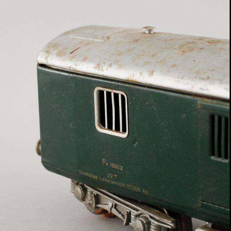 A 1940/50s model train set of 31 pcs in O-scale made by HAG, Switzerland.