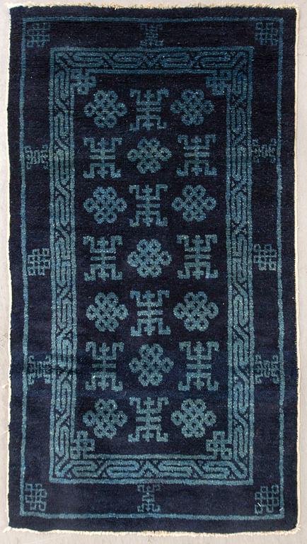 A semiantique Chinese Baotou carpet ca 114x64 cm.