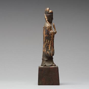 A copper alloy figure of a daoist dignitary, late Ming dynasty (1368-1644).