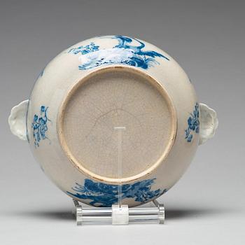 A blue and white armorial tureen with cover, and stand, Qing dynasty, 18th Century.