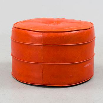 A 20th century patent leather circus pouf.