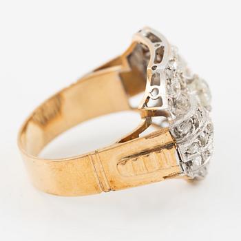 Ring in 18K gold and platinum set with an old-cut diamond and rose-cut diamonds.