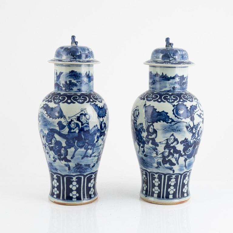 A pair of blue and white urns with covers, China, 19th century.