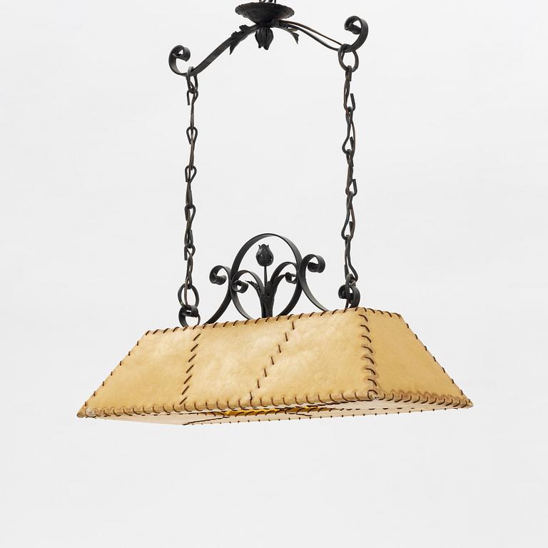 A chalet style mid century modern ceiling lamp.